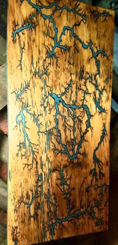 fractal lichtenberg figure wood burning with electricity by a piece of wood burns to form ash