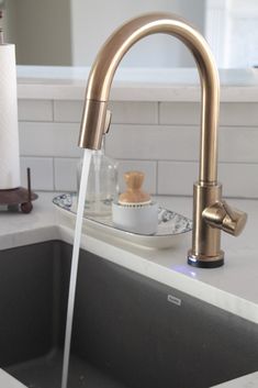 Stainless Steel Sink With Gold Faucet the kitchen bling gold faucet
