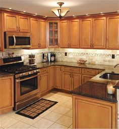 37 Best Granite Countertops With Oak Cabinets Images Kitchen Modern Kitchen Cabinets Cabinet Design Ideas Home And Garden New