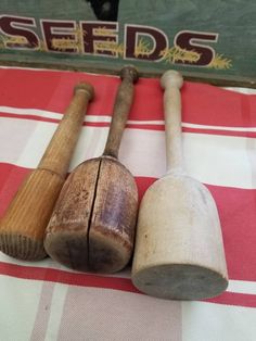 It seems the antique potato Mashers are gaining in popularity with Farmhouse fans. I've seen them stacked on shelves, tossed into pottery bowls and lined up neatly like little soldiers on soffits. These three antique wooden potato Mashers are in rustic primitive condition. One appears to be more aged and more used than the other. All 3 have signs of being well used. The first masher and the smallest measures approximately 9 in in height. It has a rather rounded base, so it will not set up right