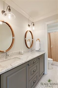 5 Things Every Fixer Upper Inspired Farmhouse Bathroom Needs Lovely Bathroom Features A Gray Dual Washstand Topped With Carrera Marble Ed His And Her Sinkodern Faucets Placed Under Individual Oval Rope