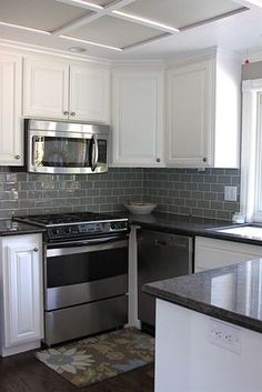Smoke Gl Subway Tile Pinterest White Shaker Cabinets After Kitchen Cupboards Painted New Gl Subway Tile As Backsplash In Fog