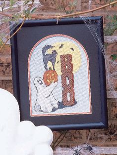 pattern isnt too scary but it sure is cute featuring a friendly ghost a black cat and a jack o lantern it makes a great halloween decoration