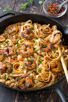 This delicious cajun shrimp pasta has a flavorful and smoky “kick” from the creole seasoning and the creamy roasted red pepper sauce! | thecozyapron.com #cajunshrimppasta #cajunshrimppastaalfredo #cajunshrimppastaeasy #cajunshrimppastarecipes #cajunshrimppastacreamy #cajunshrimppastafettuccine #cajunshrimppastarecipe