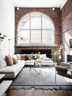 living room | interior design | exposed brick wall | big grid window | white sofa | modern | simple | neutral Camo Living Rooms, Small Living Rooms, Interior Design Living Room, Bedroom Design, Interior Decorating, Decorating Ideas, Design Interior