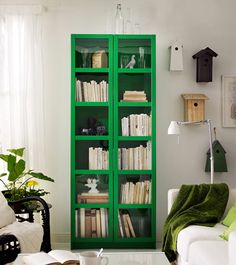Pantone S 2017 Color Of The Year Emerald Green Hgtv Emeralds And Love The Painted Bookshelf With Gl Front