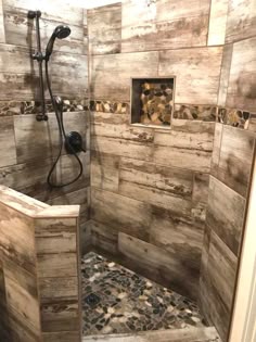 Decorating With Brown And Gray A Pairing That May Surprise You This Beautiful Rustic Modern Shower Combines Our Bwood Cream Tile With Bora Wilderness Pebbles Rusticbathrooms