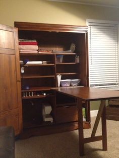 This Craft Cabinet Has A Hidden Drop Down Table That Hides Behind This Craft Cabinet Has A Hidden Drop Down Table That Hides Behind Pocketing Doors When Not In Use Ideas Pinterest Office Guest Rooms