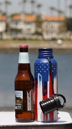 Feeling patriotic? Well, here's your chance to prove it with your very own fancy shmancy American Flag BottleKeeper. Insulated to keep your beer colder, longer, and protected from breakage, The Standard BottleKeeper 2.0 is made for the typical 12 oz bottle such as Bud Light and Corona -- there's also a bottle opener in the cap so you can impress your friends when you pop their tops. Bud Light, Pot Mason, Mason Jars, Cool Gifts, Diy Gifts, American Graffiti, American Flag, American Beer, Holiday Gifts