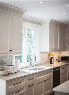 gray kitchen. gray kitchen cabinet with brick backsplash wall and gray kitchen. gray kitchen cabinet with brick backsplash wall and