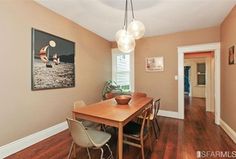 Who Thought Orange Walls White Trim And Black Furniture Didn T Have Sherwin Williams Nantucket Dune