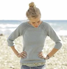 Free Knitting Pattern for a Raglan Lace Sweater. Women's sweater to knit in a classic design with a pretty little detail in the lace raglan sleeves.