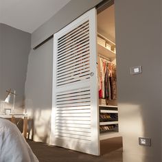 Porte coulissante seule à lames orientables Solana Porte Porte coulissante seule à lames orientables Solana Porte