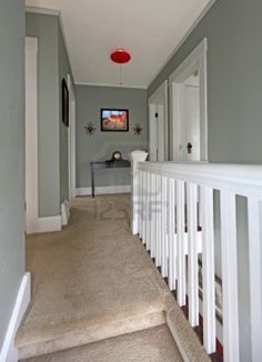 Pin By Jessica Mackay On For The Home In 2019 Beige Carpet Grey Upstairs Hallway With White Railing And Beige Carpet Stock Photo
