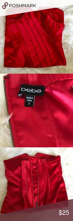 Bright red satin strapless Bebe camisole top Amazing red color Bebe camisole top cute zipper detail. Looks amazing under a navy or black suit! Worn twice... perfect also for valentines date or Christmas party. bebe Tops Camisoles