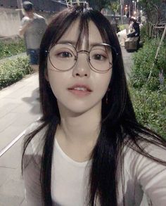 Glass Asian girls kiss