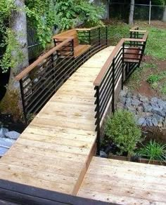 Arched footbridge made of cedar with two built-in facing benches - connect the backyard and woods with the back of the house Back Garden Landscaping, Wooden Bridge Garden, Yard Bridge, Outdoor Bridges, Backyard Bridges, Garden Bridge Design, Wooden Bridge, Outdoor Structures, Outdoor Landscaping Ideas Front Yard