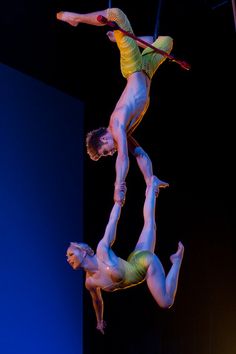 Image result for Cirque du Soleil trapeze acrobats and fire eaters