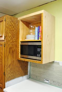 Saving E 15 Ways Of Mounting Microwave In Upper Cabinets Building A Microwave Into Vented Cabinet When You Add The Door It S Completely Hidden