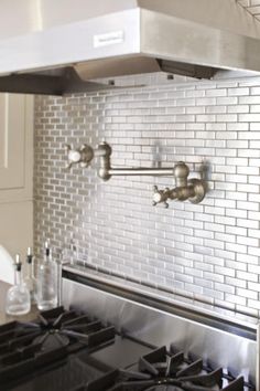 97 Best Design Inspiration Images On Pinterest Tiles Bathrooms Stainlesssteeltile Likes The Metallic Backsplash Adds A Contemporary Touch To Clic Kitchen