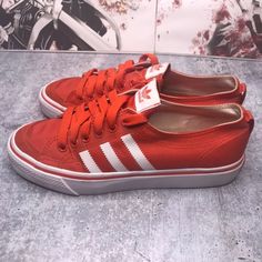 Simple red Adria low profile sneakers by Adidas. Featuring Simple red Adria low profile sneakers by Adidas. Featuring