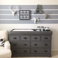 grey changing table with drawers