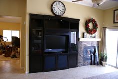 Completed custom entertainment center with shaker pillars (to hide ... Completed custom entertainment center with shaker pillars (to hide ...