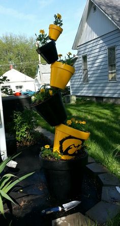 39 Best Hawkeye Diy Images On Pinterest Iowa Hawkeyes Leaning Pot Tower In Iowa Hawkeye Paint Scheme Nothing I Would Ever Want My Yard Maybe Sarah Betts Or Lindsay Petersen