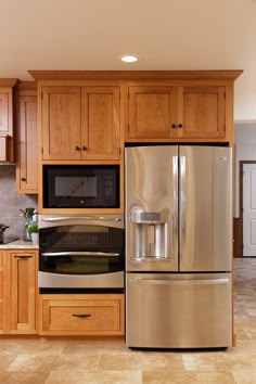 This Tall Microwave And Oven Cabinet Follows The Cur Trend To A Built In Oven With The Microwave Above