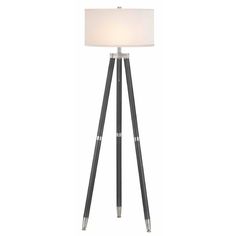 Modern Brushed Chrome Tripod Style Floor Lamp with a Beige Cylinder Light Shade Modern Brushed Chrome Tripod Style Floor Lamp with a Beige Cylinder Light Shade