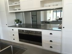 White Kitchen Grey Splashback white kitchen with grey glass splashback | home is where the heart White Kitchen Grey Splashback white kitchen with grey glass splashback | home is where the heart