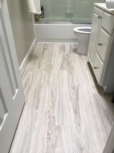 Vinyl Plank Bathroom Floor Budget Friendly Modern Update The Look Of Your Bat Kitchen Or Bathroom With This Trafficmaster Allure Alpine Elm Luxury Vinyl Plank Flooring Durable Is