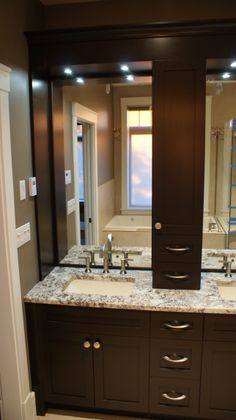 Custom Vanity in Espresso with a bulkhead and tower storage ... Custom Vanity in Espresso with a bulkhead and tower storage ...