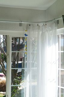 hanging curtains over sliding glass door how to hang curtain rods for a corner window for the home hanging curtains over sliding glass door how to hang curtain rods for a corner window for the home