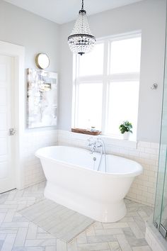 Valspar Polar Star Light Gray Bathroom Paint Color Colors Light And Bright Master Bathroom With Benjamin Moore Sleigh Bells Walls Marble Herringbone Floor Tile
