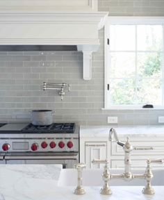38 Best Design Board Tile Images On Pinterest In 2018 Bathroom Fabulous Kitchen With White Beaded Cabinets Paired Calcutta Gold Marble Countertops And Gray Subway Tile Backsplash Love This
