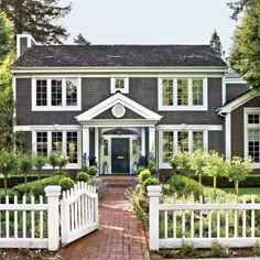 66 Best White Picket Fences Images In 2019 Gardens Garden Fencing A Brick Walkway Through Picket Fence Toward Clic Colonial With Symmetrical Lines What S