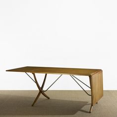 The Achilles table has a raw oak top with soft chamfered edges ... The Achilles table has a raw oak top with soft chamfered edges ...