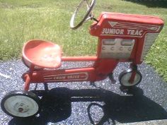 1953 kiddie tractor tricycle played on one of these when at my aunt western flyer tractor pedal car