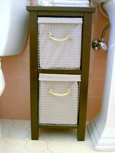 Under Bathroom Sink Organization Why Didn T I Think Of This Before Between Toilet And Pedestal Sink Small Storage E Oh Yeah There Is A All This Stuff Would Have To Be Waterproof In Our House Though