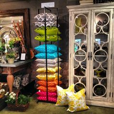 Great Pillow Display.....love that the cushions can be seen from all sides Market stall ideas ...