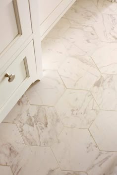 Bathroom Tiles Floor white hexagon bathroom floor tile with grey grout. | the blue Bathroom Tiles Floor white hexagon bathroom floor tile with grey grout. | the blue