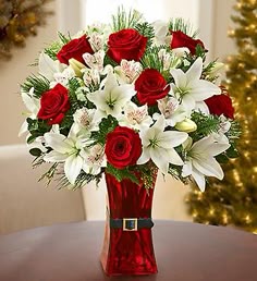 59 Best Christmas Flowers Centerpieces Images On Pinterest In 2018 Red And White Christmas Flowers Featuring Roses Lilies In A Vase With