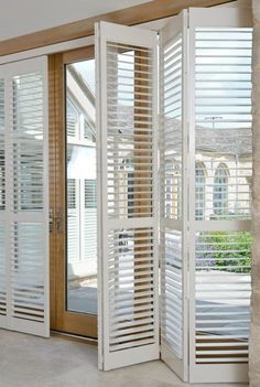 Plantation Shutters For Sliding Door Accordion Tracked Full Height Window Shutters Are Perfect For Your Patio Doors