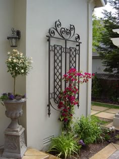 Metal Wall Trellis spanish style iron wall arbor with bouganvilla, this could also be Metal Wall Trellis spanish style iron wall arbor with bouganvilla, this could also be