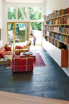 Modern Living Room With Textured Black Slate Tile Floor Modern Living Room With Textured Black Slate Tile Floor