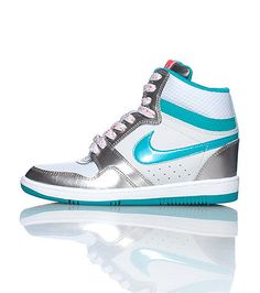 Nike Shoes on | Nike logo, Lace closure and Zig zag NIKE Womens's wedge sneaker Lace up closure NIKE swoosh on sides Metallic silver detail Padded tongue