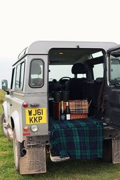 10+ Images ideas | jeep wagoneer, jaguar xk convertible land rover around camp fire Google Search