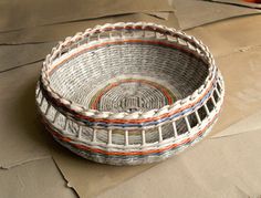 Weaving baskets with newspaper