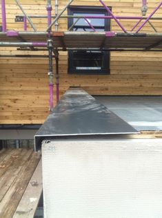 Best and inexpensive options on capping a parapet wall